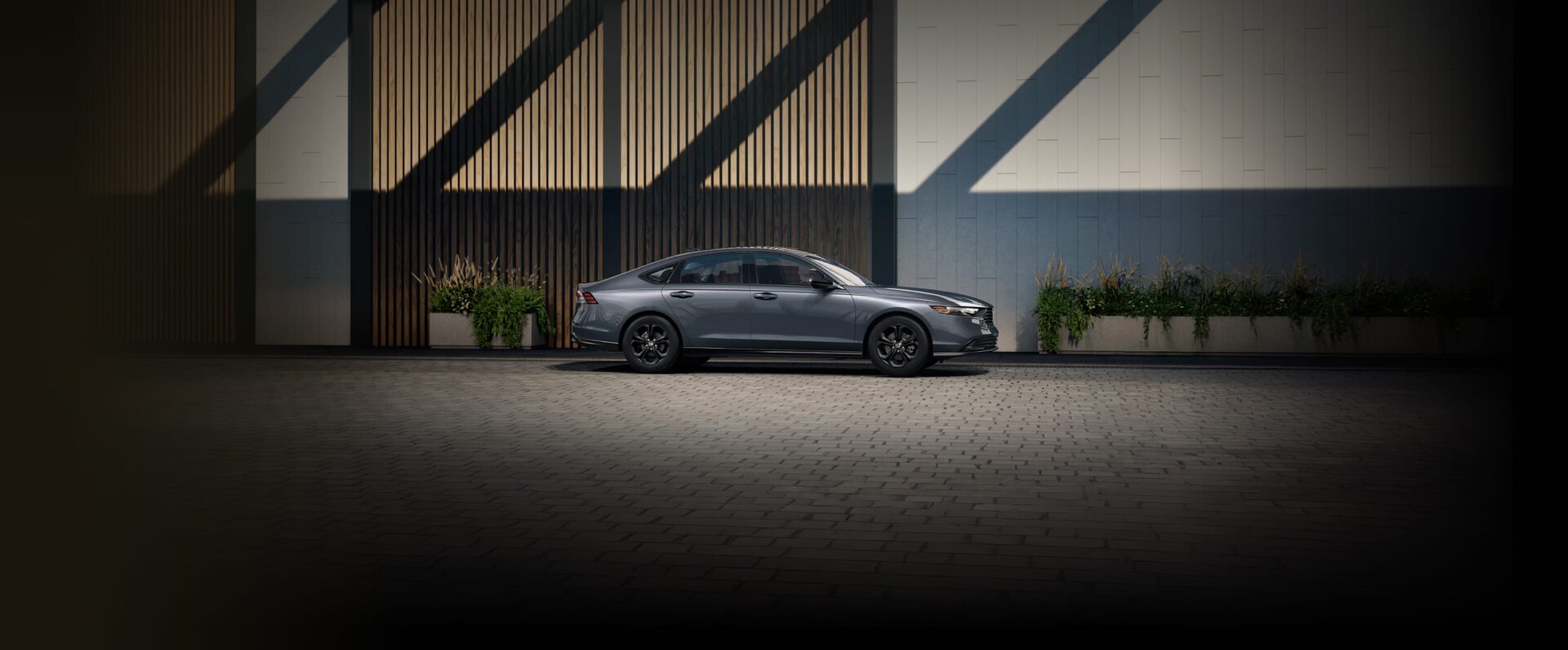 Side view of a Honda Accord in Meteorite Gray Metallic