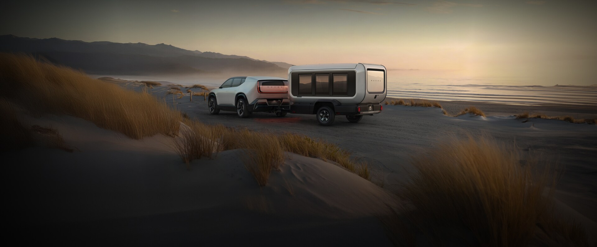 Honda Base Station Parked in a beach at sunset